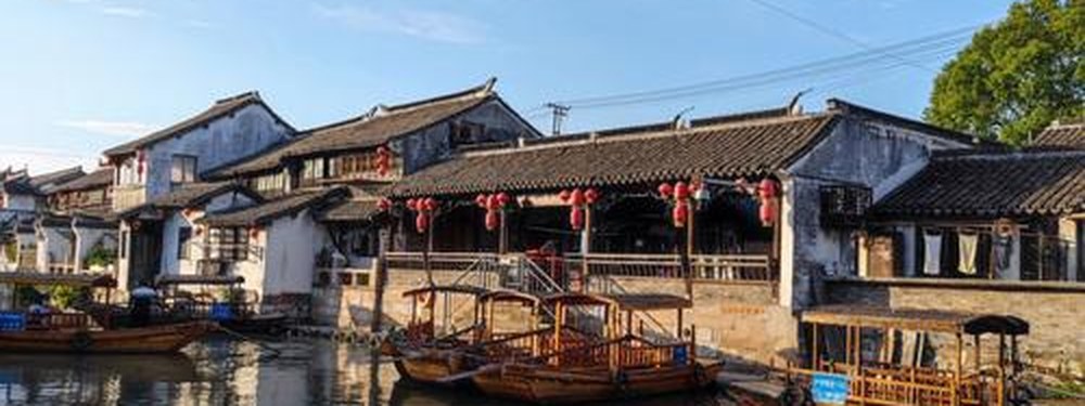 Photograph of a canal-side old Chinese street, the Fengjing water town walk